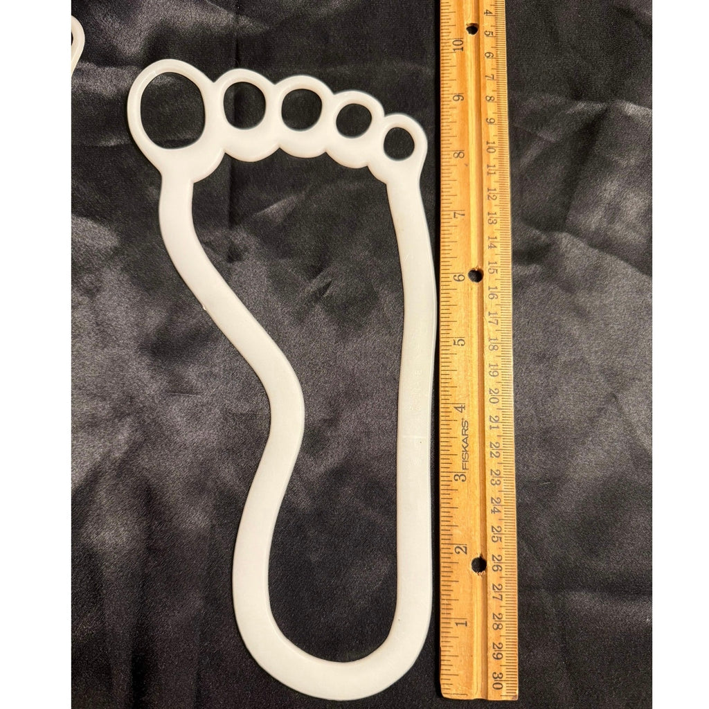 Vintage 90’s Glow in the Dark 10” plastic footprints Set of 8