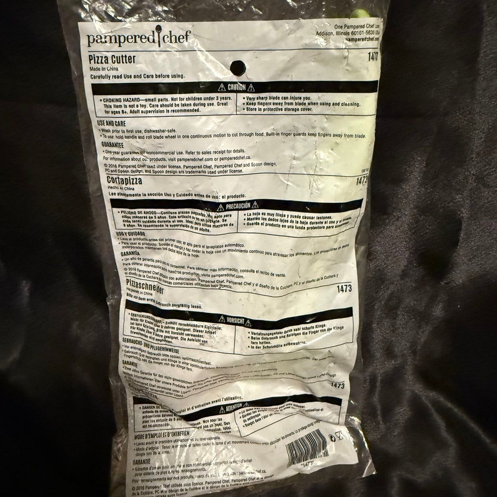 The Pampered Chef kids pizza cutter New in bag Item number 1473